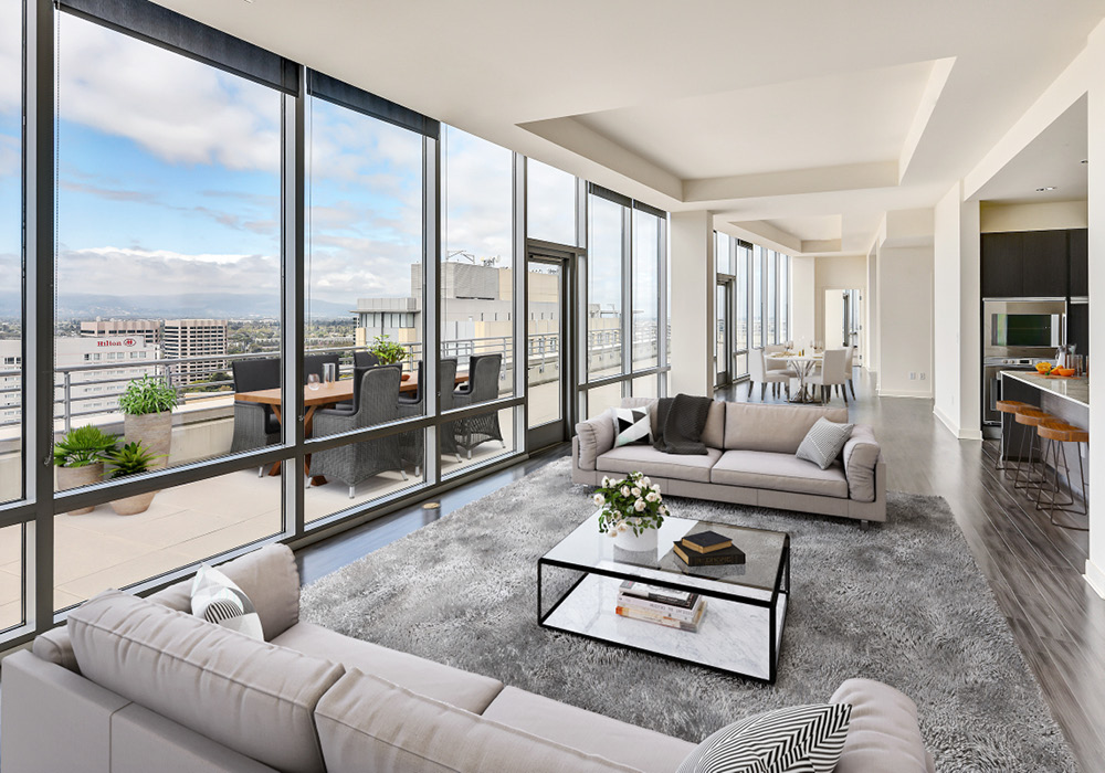 Staged living room of a penthouse apartment at 360 Residences.
