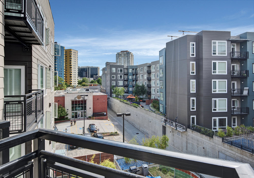 Neighborhood view from a Taylor 28 apartment balcony.