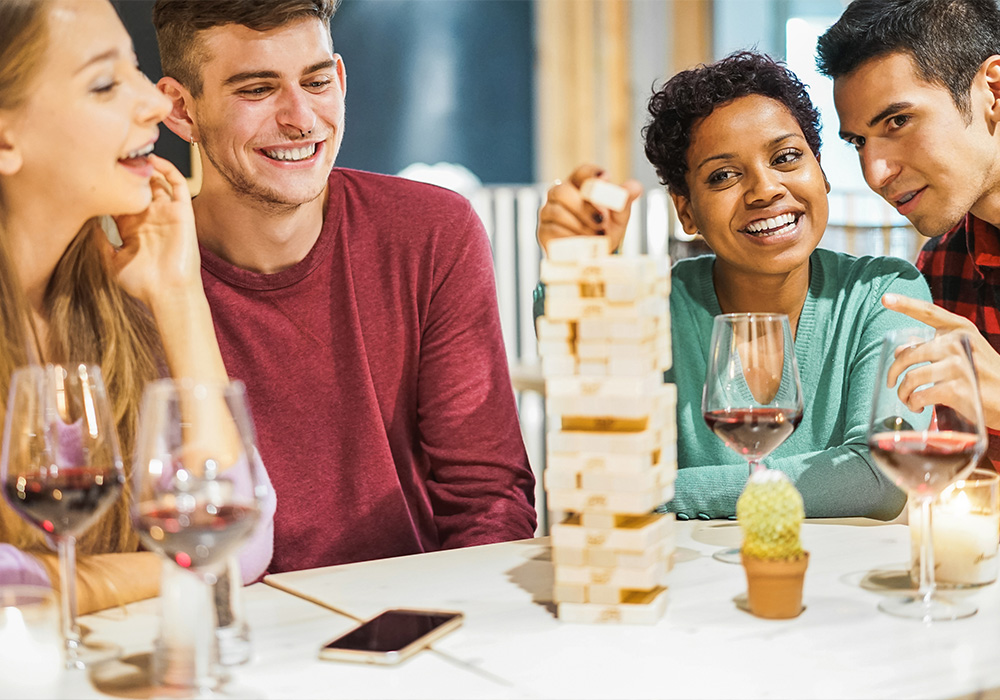 Fun and games at Friendsgiving in an Essex apartment home